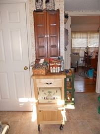 Butcher block with storage and wall cabinet above