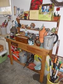 Garden work table with various garden kits and decorative items