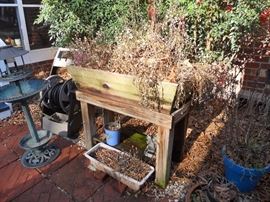 One of 2 outdoor wooden planter boxes