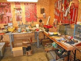 Various tools and Blackhawk wall tool holders