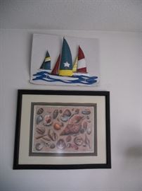 Sailboat plaque and framed shell picture
