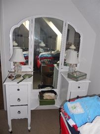 Antique dresser with folding mirrors