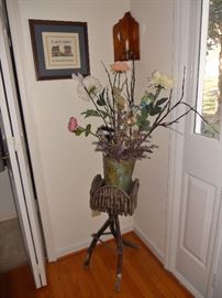 Twig plant holder and attractive flower arrangement