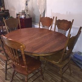 Super nice wooden kitchen table and six chairs