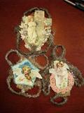 Several Antique Dresden Scrap type Christmas Ornaments