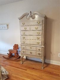 Chalk-painted tall chest and wooden rocking horse