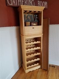 Wine rack with slots for glassware