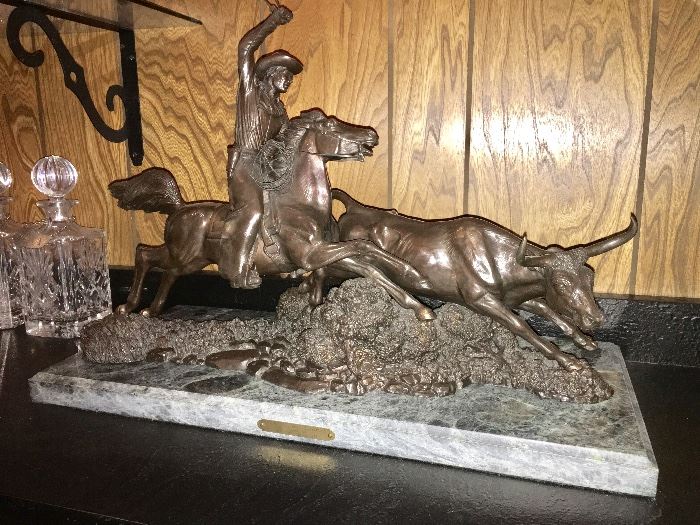 The Herd Quitter inspired by C. M. Russell bronze statue