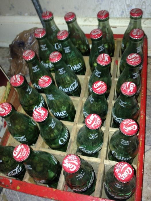 A case of Coke Classic bottles