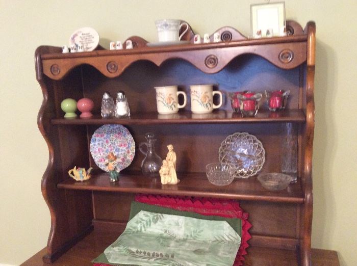 Close up of collectibles on hutch