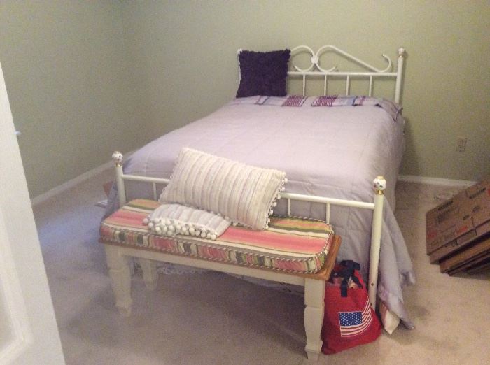 White full size iron bed with mattress & box springs - bench at end of bed