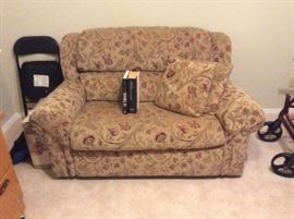 Love seat - is also a hide-a-bed