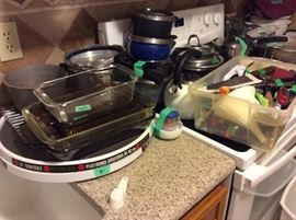 Cooking pans, more pyrex, lots of utensils