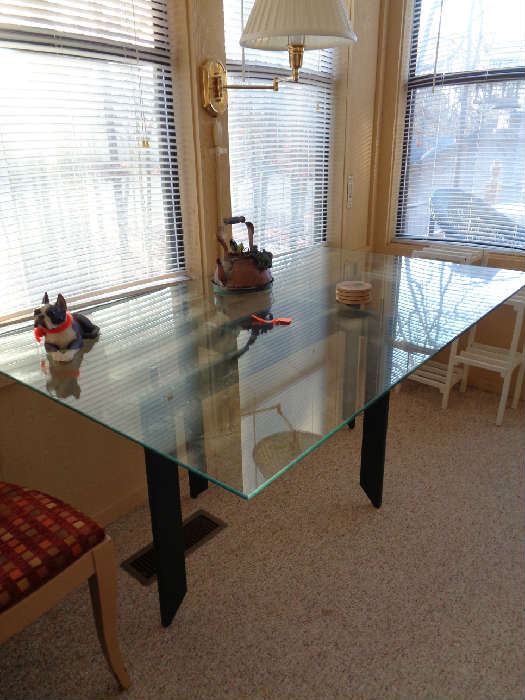 glass topped table, no chairs