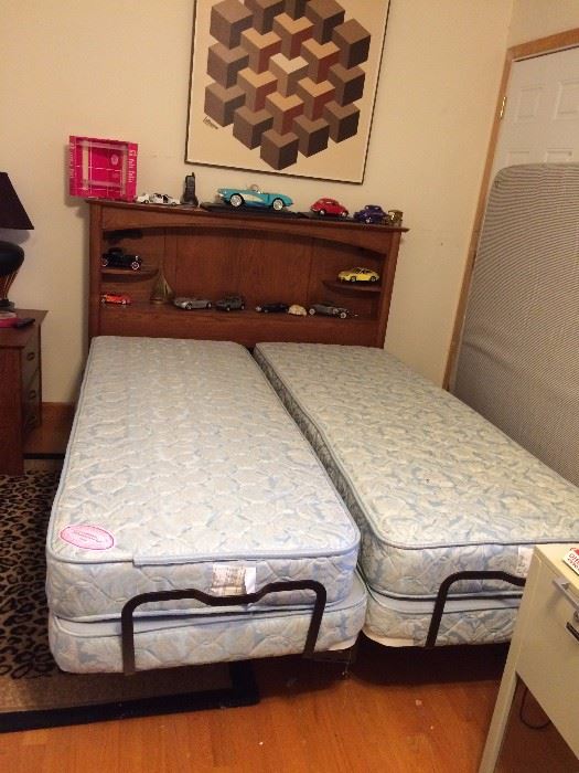 #5 oak 64x44 bookcase king headboard
#3 (2) Craftmatic twin lift mattress sets $50 ea — at Rickwood Dr Nw Huntsville 35810 Call 256-508-331eight.