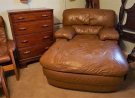 Leather chaise and antique mahogany chest of drawers