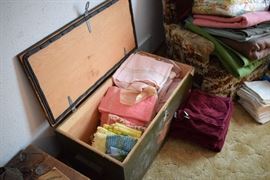 Towels.  Old wooden trunks