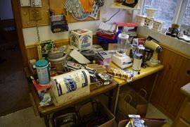 Kitchen items including standing mixers, blenders, crockpots