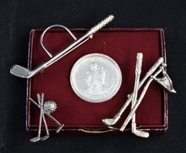 Sterling pins and a collectible coin