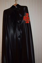 Cape/Robe from The Equestrian Order of the Holy Sepulchre. The Equestrian Order of the Holy Sepulchre of Jerusalem (EOHSJ) is a nine-hundred-year-old organization with a mission of critical need today: to help preserve Christianity in the Holy Land. It is a lay order under the protection of the Holy See with members worldwide who actively support the Latin Patriarch (the Archbishop of Jerusalem) with prayers, donations and a presence through pilgrimages. Practicing Catholics who actively support their diocese and parish may be nominated to be members of the Order.