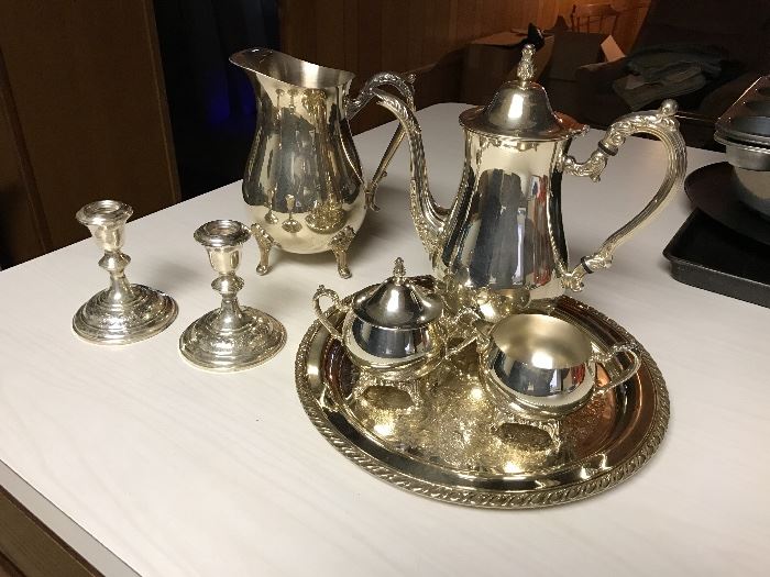 Silver plated coffe/tea serving set, pitcher, candle sticks and other goodies