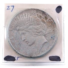 1927 Peace Dollar: A 1927 Peace dollar. Designer: Anthony de Francisci. Diameter: 38.10 mm. Weight: 26.73 grams. Mintage: 848,000. Metal Content: 90% silver 10% copper.