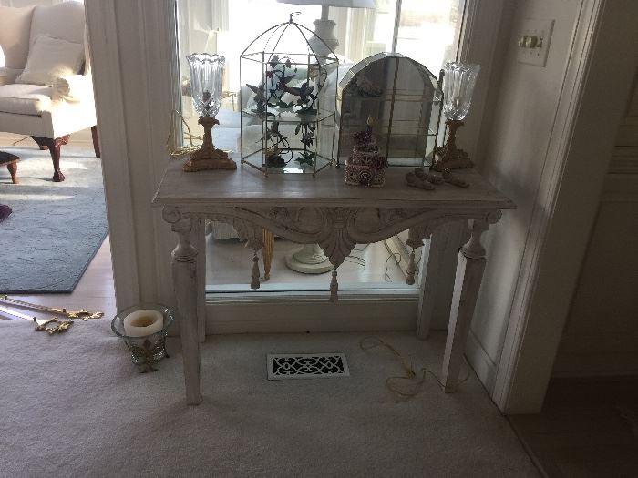 Elegant side table and collectibles
