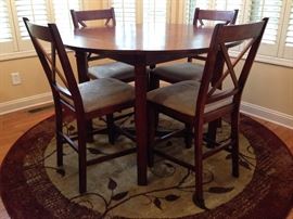 Dark Wood Drop-Leaf Pub Style Dinette Table and Four Dark Wood Pub Style Upholstered Seat Dining Side Chairs - Detail