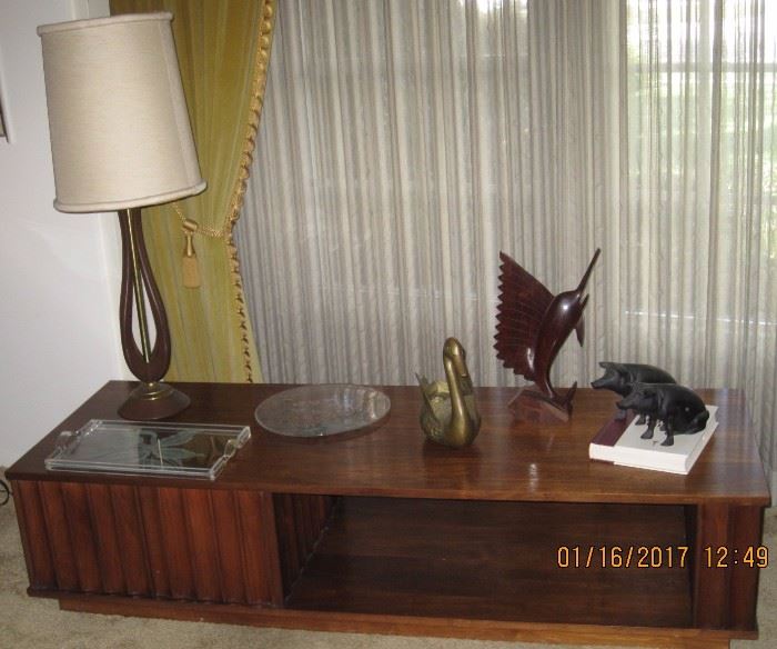 Long Walnut Coffee Table with Mid Century Lamp, Ironwood Swordfish and Cast Iron Pig Banks