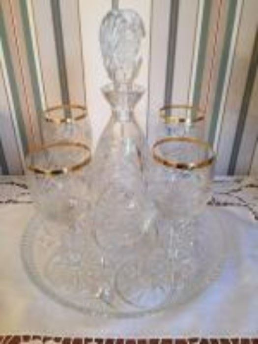 Decanter with gold rimmed glasses