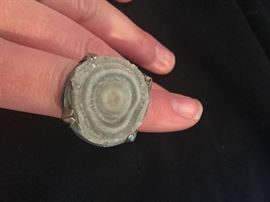 A large quartz ring from "The Berkley" Collection from Grimballs Jewelry "Bold Ring with Large Round Faceted Rutilated Quartz in 18ky bezel with sterling silver shank" size 7/7.5