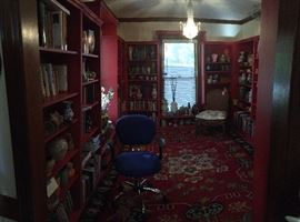 To the left as you enter the front door. Books that aren't as great in value (lots!), Ben Owen pottery, Siglinda Scarpa pottery, Fred Johnston pottery and Bull Dog Pottery. 