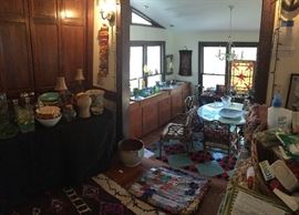 Just past the kitchen we have some practical linens, kitchen items, art and rugs. Be sure you're looking up, down and all around!