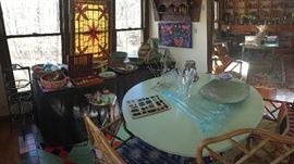Past the library and kitchen is the "dining room" or sun room. Practical pottery, Art Deco French prints, Chinese Chippendale chairs and lots of art is in this room. 