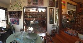 Past the library and kitchen is the "dining room" or sun room. Practical pottery, Art Deco French prints, Chinese Chippendale chairs and lots of art is in this room. 