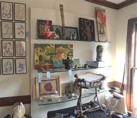 Checkout room. To access this room - go right as you enter the front door. This is where the fine, more expensive art, jewelry, pottery and tiles are being kept.  Also home to the fabulous entertainment center, Communist lamp and expensive small items are being kept.