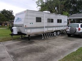 Brand new refrigerator & Hot Water heater
Living Room slideout
3 burner stove, microwave, oven
Booth Dinette
AM/FM CD Player
Duct A/C
Grab handle
Power Tongue Jack
Front & Rear stabilizer jacks
Roll down Awning
Add on rear storage compartments
Good condition
Outside Shower
