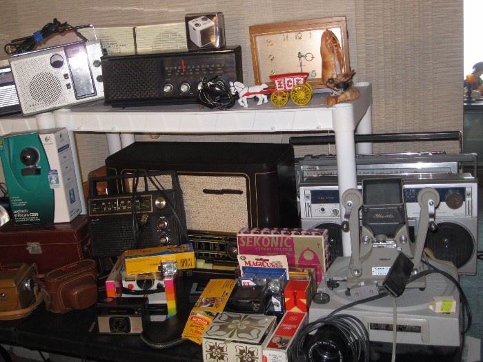 Many vintage electronics and rotary phones