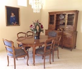 Dining table, 6 chairs, 3 leaves, leaf storage stand (not shown) and a 2-piece hutch. The PAINTING is NOT for sale. 