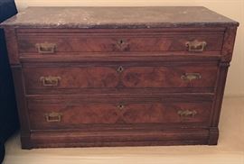 Marble top antique three drawer chest. 42 inches wide by 18 inches deep by 26 inches high