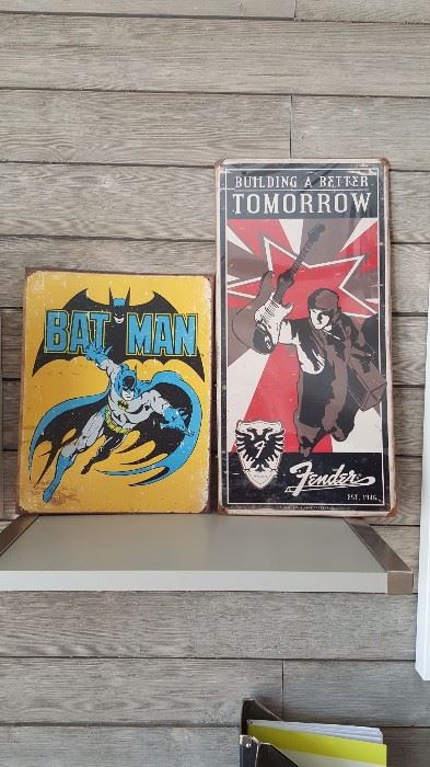 Retro Bat Man and Fender metal signs.