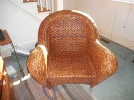 From a set of two with ottoman and table not shown. Has cushions