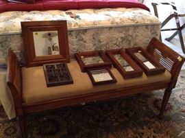 Bench with caned sides.