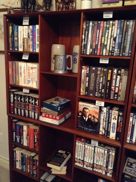 Lots of great movies and books fill these cabinets.