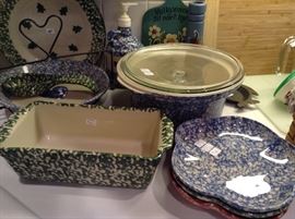 This is Workshops of Gerald Henn pottery from Ohio.  If someone in your family collects this it makes a great gift.  I personally have had the loaf pan and the casserole for nearly 25 years and they still look brand new.