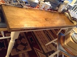 One of two kitchen tables in this sale.  This is one solid top.  I know, because I moved it from the other house.  