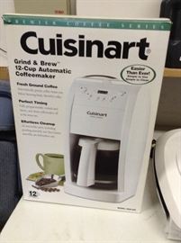 Many kitchen appliances like new in their boxes.