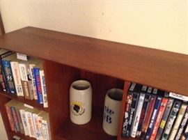 Far left top of the book shelves.