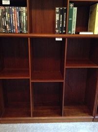 This is the middle cabinet base.  The only cabinet with wear on the bottom shelves.  I believe to be from books.