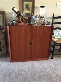 Tambour Door Cabinet by Soborg Mobler.  Lots of fun barware.